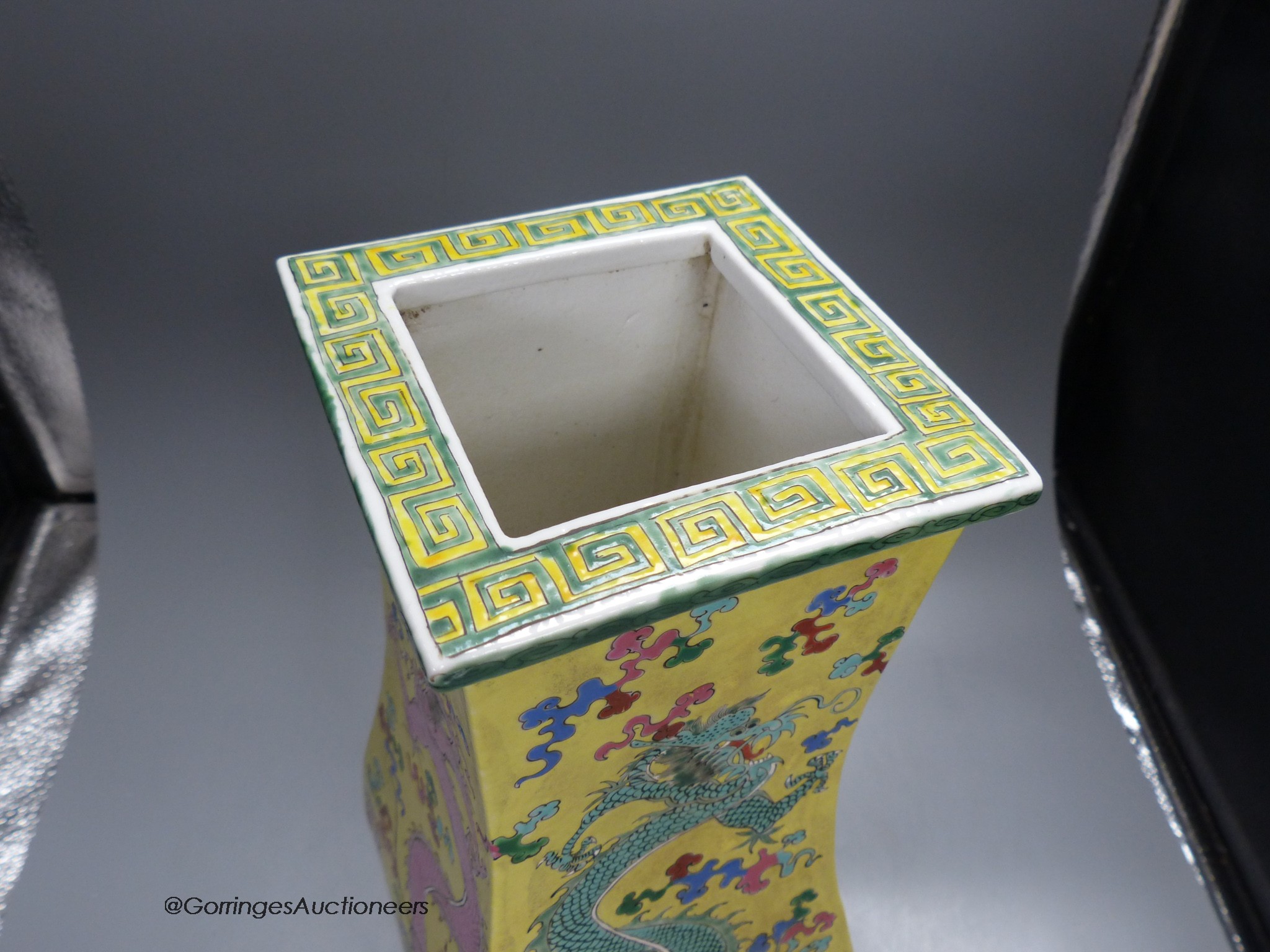 A Chinese yellow ground 'dragon' square baluster vase, 43.5cm high